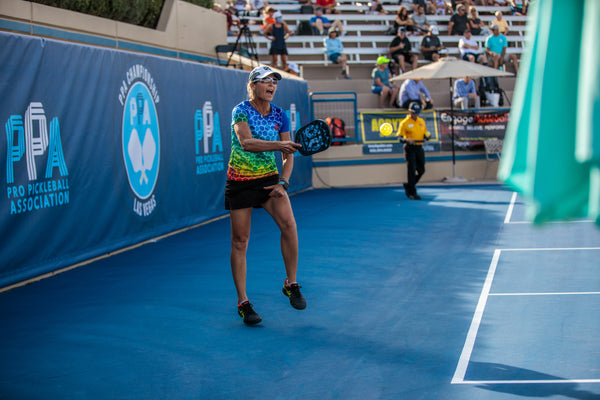 pickleball player celebrating on pickleball court