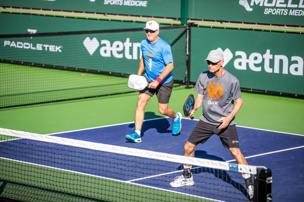 pickleball players playing pickleball 